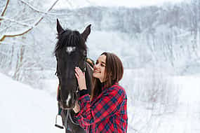 Photo 1 Small Group Horseback Riding Tour in the Snow