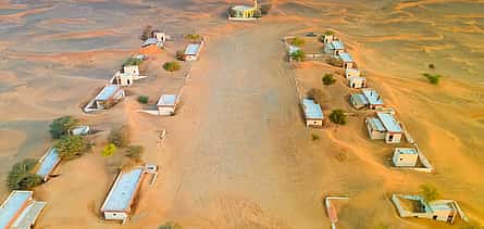 Photo 2 The Ghost Village Safari Tour with Dune Bashing and Sandboarding
