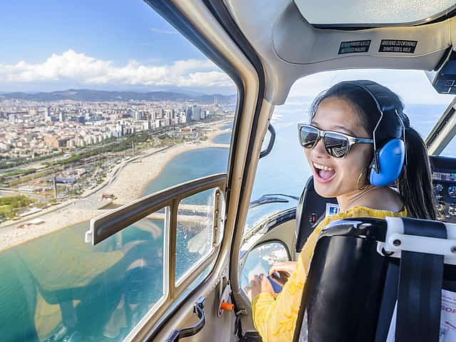 Barcelona 360: Helicopter Flight, Walking Tour and Boat Cruise
