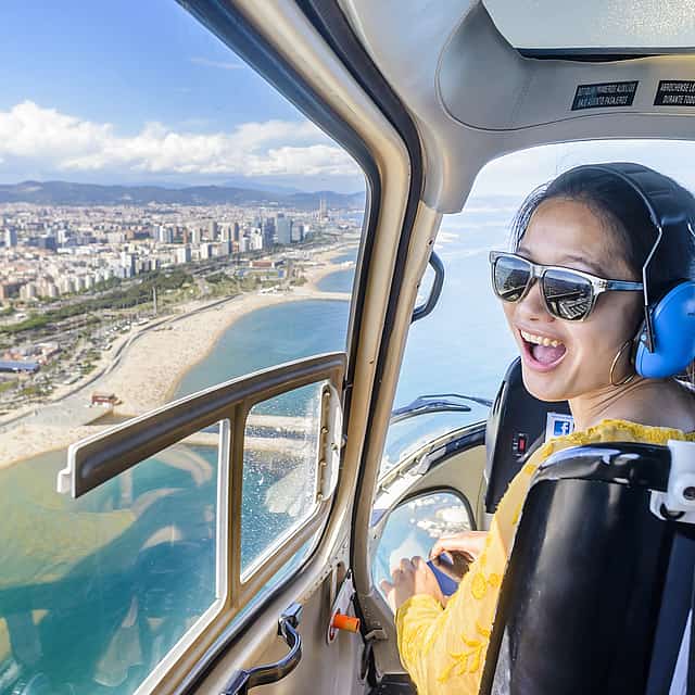 Barcelona 360: Helicopter Flight, Walking Tour and Boat Cruise