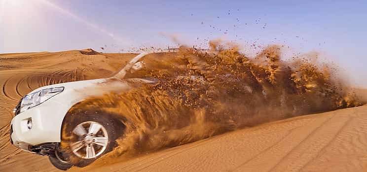 Photo 1 The Ghost Village Safari Tour with Dune Bashing and Sandboarding